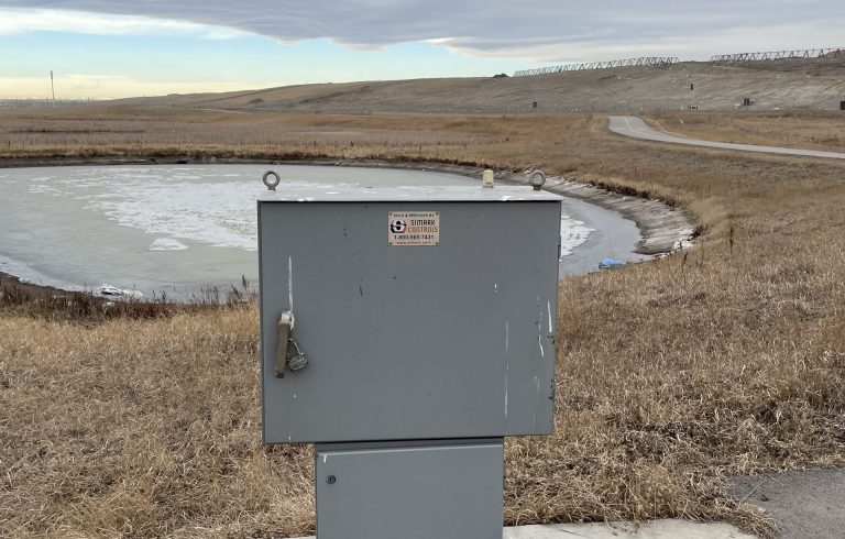 Storm pond monitoring- note the white cell modem antenna on top of cabinet